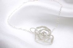 Woven Rosette Necklace by Felicia D. Roth rdcd